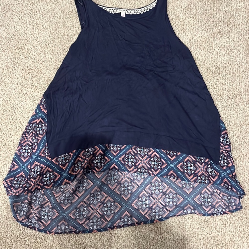 Women’s size medium exhilaration, tank top. Used but in great condition.